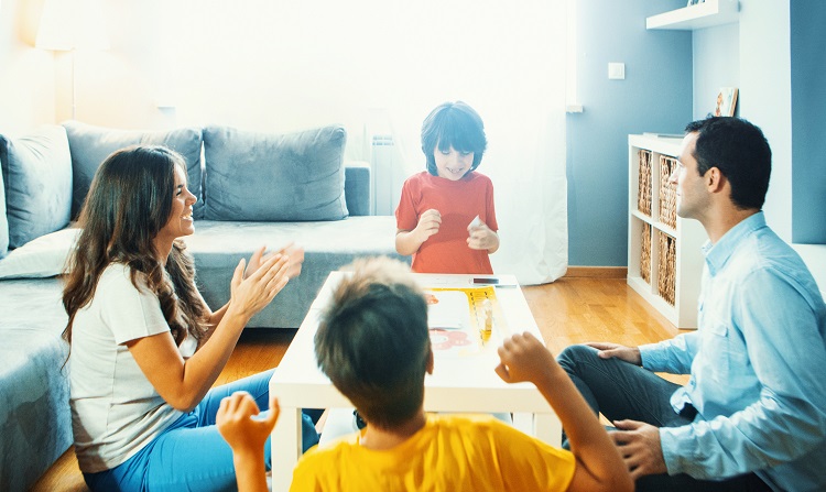 family watching tv together at night